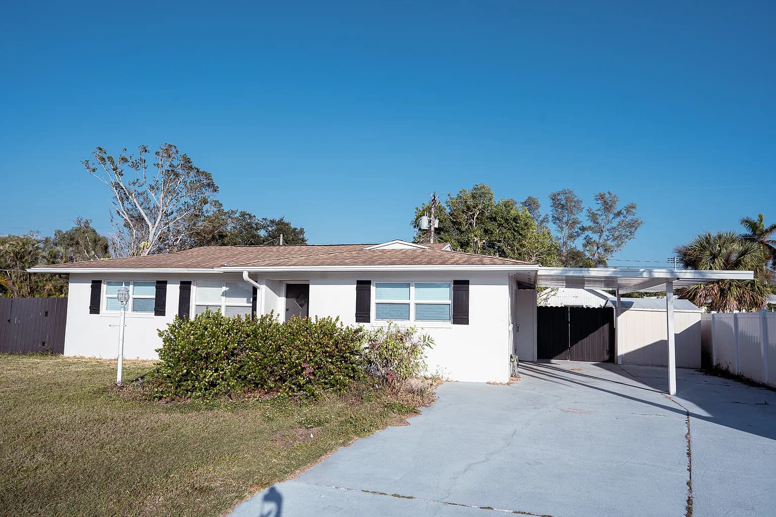 Exterior of a fully remodeled single-family home in Central Florida by CFL Home Builders